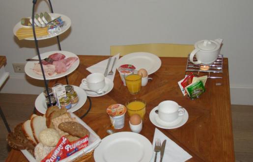 Full breakfast served out on the table Hotel de Tabaksplant