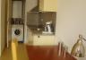 vanuit woonkamer gedeelte keuken long stay appartement Hotel de Tabaksplant Amersfoort kitchen area long stay apartment Hotel de Tabaksplant Amersfoort